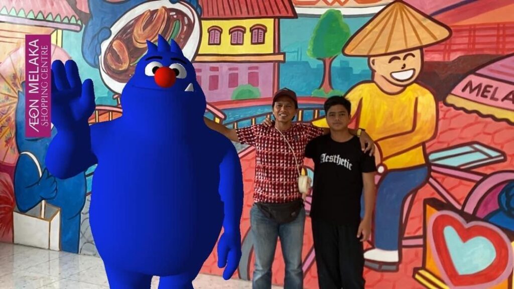 Mamee Monster character appearing as an augmented reality experience in a physical venue